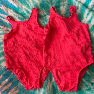 4Tand 5T new without tags swimsuit pink with gold specs two bows in the back